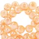 Glass beads 8mm Topaz gold transparant-pearl shine coating