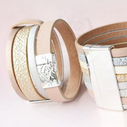Bracelets made of faux leather with metallic look